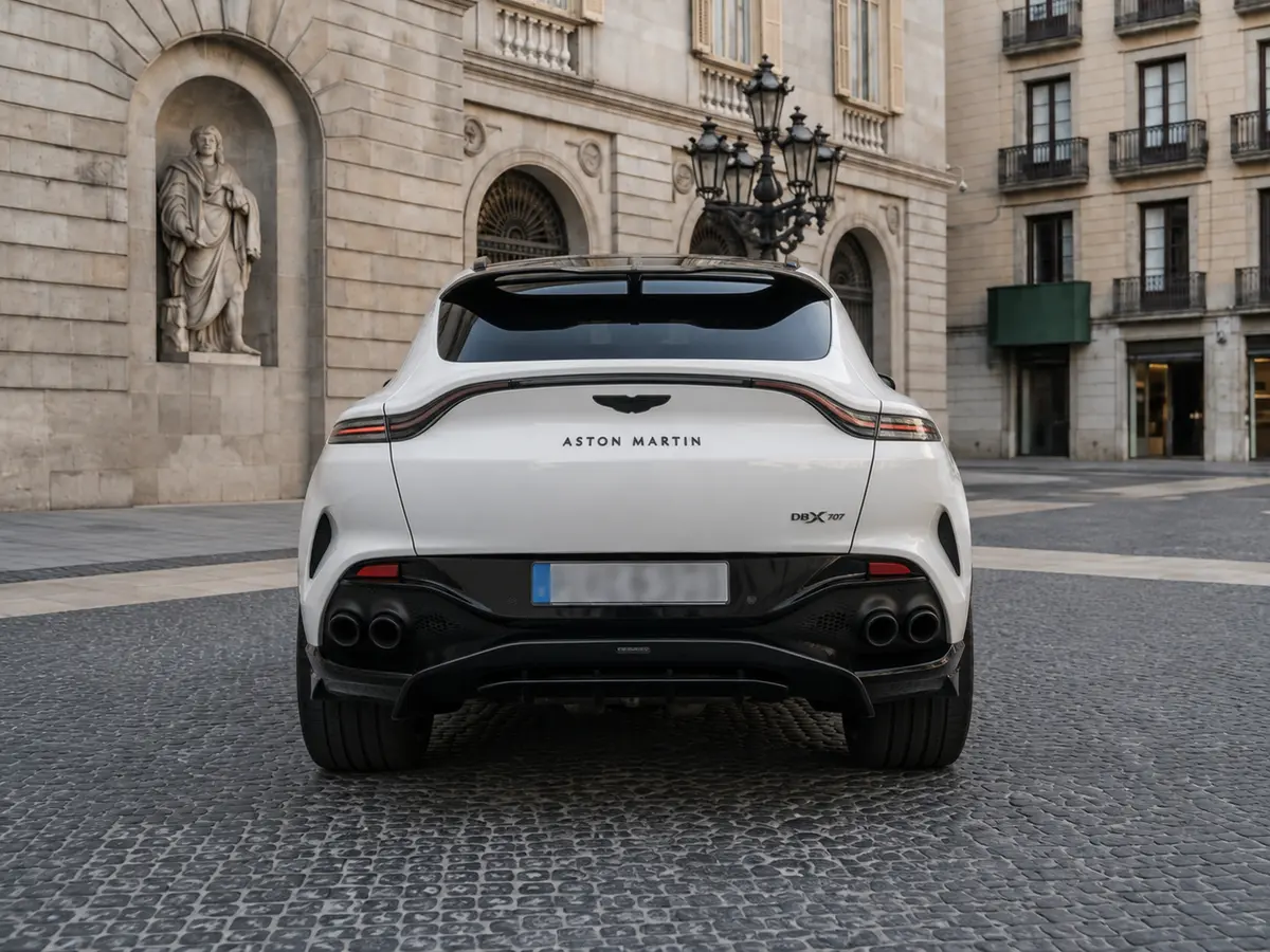 Aston Martin DBX 707 2026, rear view — Rome Luxury Car Rental, Rome. The Aston Martin DBX 707 pairs a 707 hp V8 with a genuinely usable five-seat cabin, which…