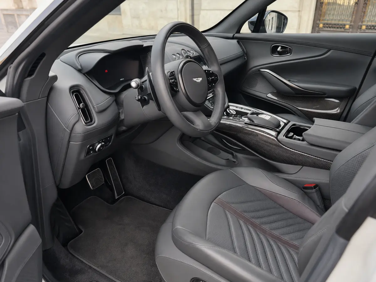 Aston Martin DBX 707 2026, interior — Rome Luxury Car Rental, Rome. The Aston Martin DBX 707 pairs a 707 hp V8 with a genuinely usable five-seat cabin, which…
