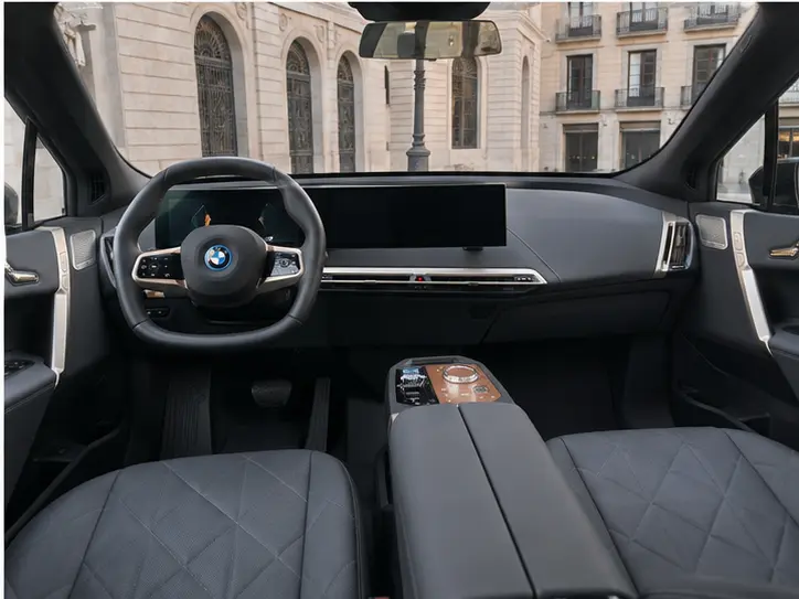 BMW IX M60 2023, exterior — Rome Luxury Car Rental, Rome. The BMW iX M60 pairs 619 hp with the composure of a full electric drivetrain, delivering…