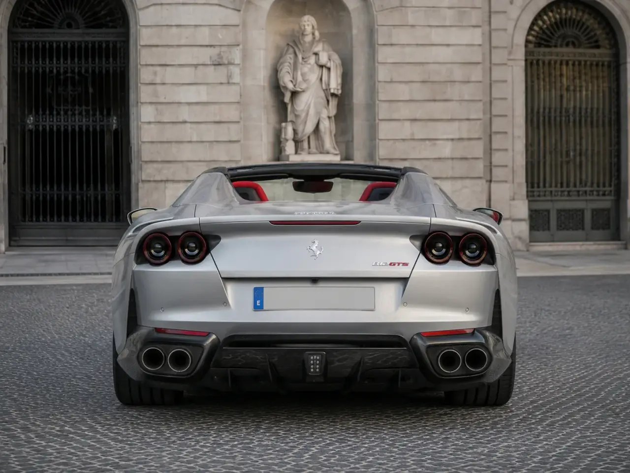 Ferrari 812 GTS 2024, rear view — Rome Luxury Car Rental, Rome. The Ferrari 812 GTS pairs a naturally aspirated V12 character with the option to drop the…
