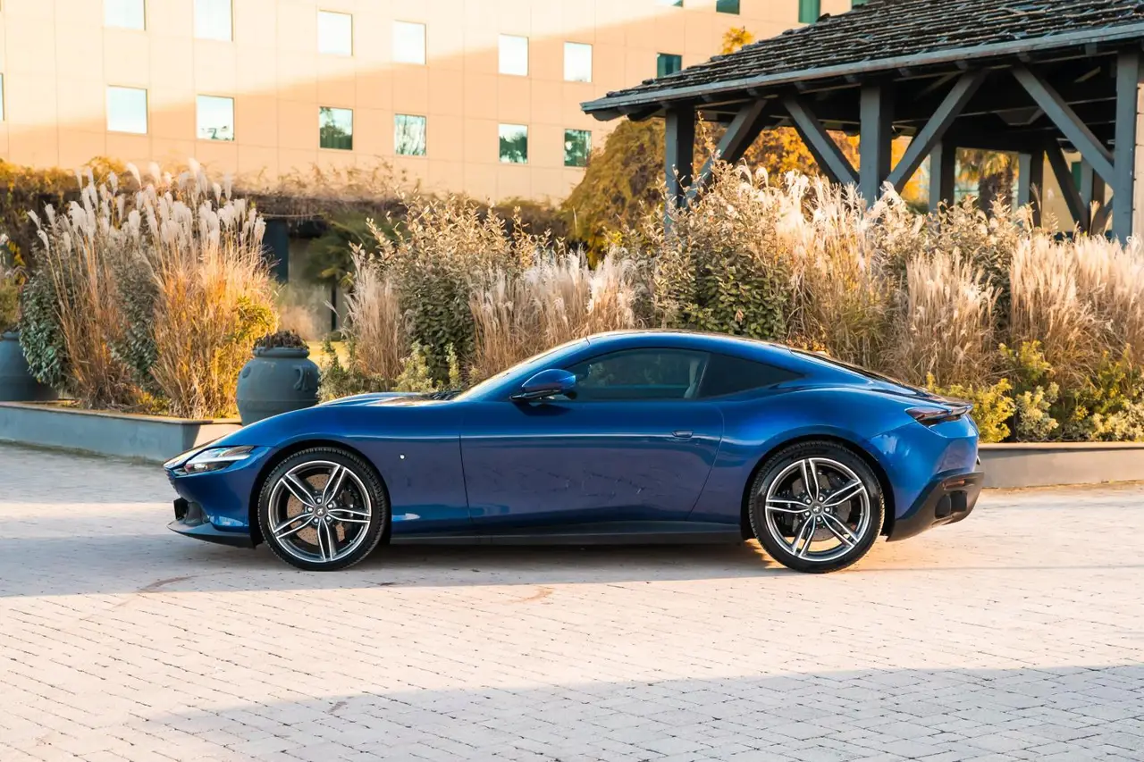Ferrari Roma 2025, rear view — Rome Luxury Car Rental, Rome. The 2025 Ferrari Roma is built around a rare proposition for this class: a 620 hp V8…