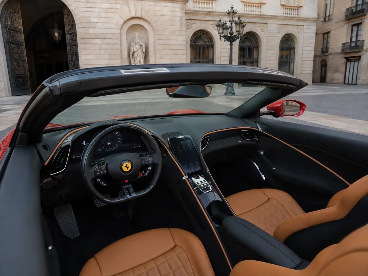 Ferrari Roma Spider 2024, interior — Rome Luxury Car Rental, Rome. The 2024 Ferrari Roma Spider pairs a 620 hp V8 with a soft-top body designed for open-air…