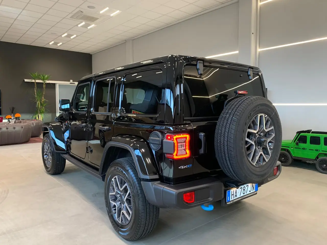 Jeep Wrangler 2025, exterior — Rome Luxury Car Rental, Rome. The 2025 Jeep Wrangler brings a different register to the fleet — boxy, upright, and…