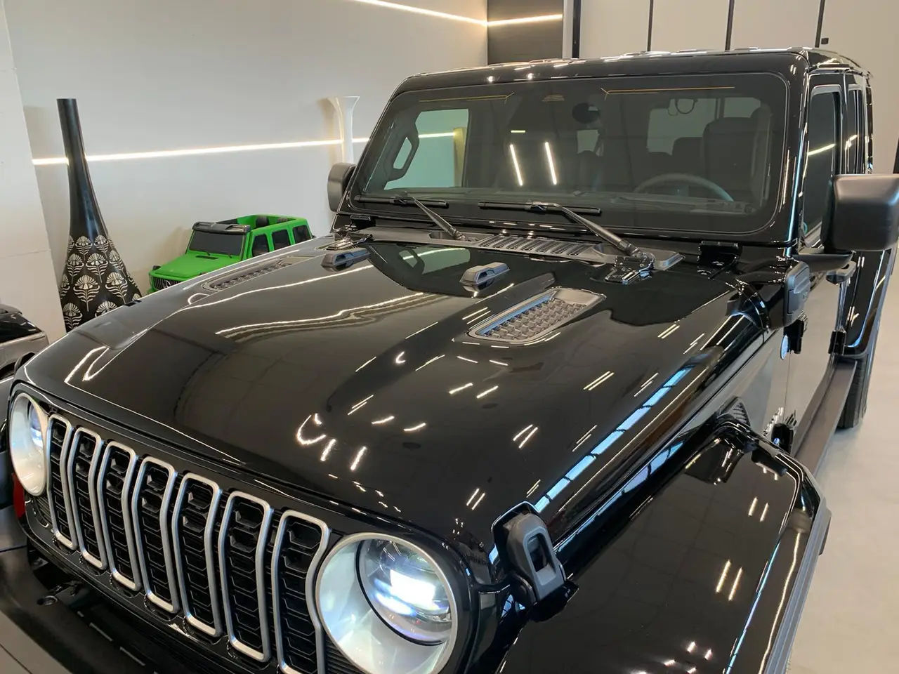 Jeep Wrangler 2025, dashboard — Rome Luxury Car Rental, Rome. The 2025 Jeep Wrangler brings a different register to the fleet — boxy, upright, and…